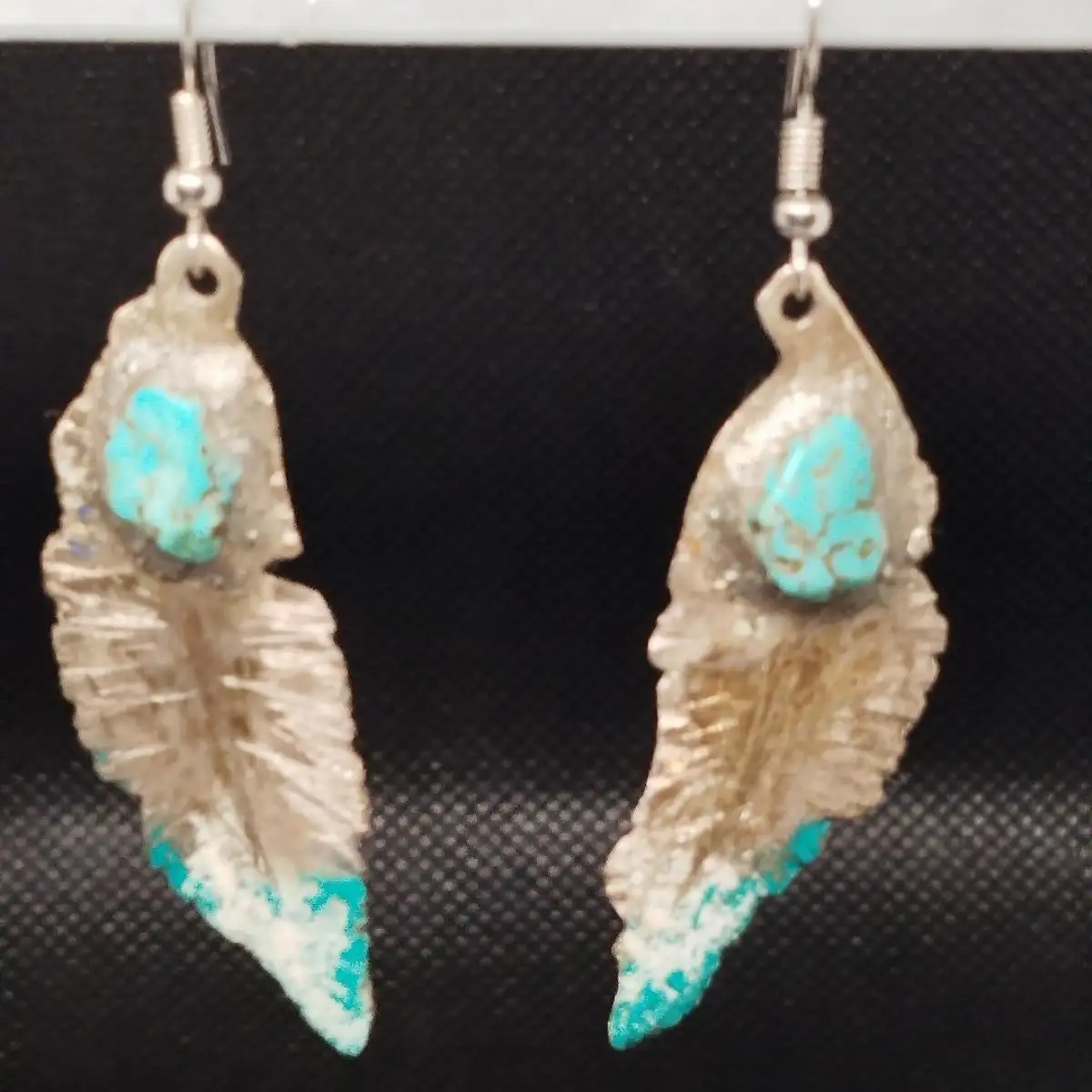 Plumes turquoises